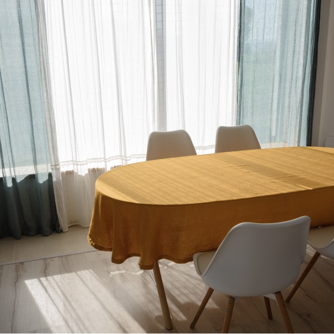Mustard oval tablecloth