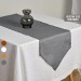 Charcoal gray table runner with triangular edges