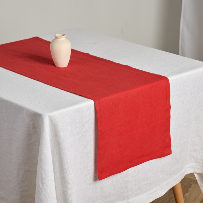 Burgundy table runner with triangular edges
