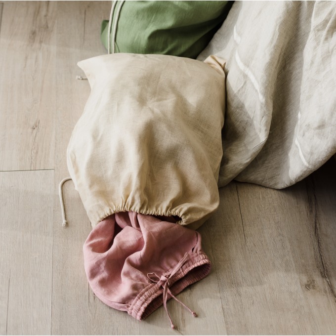 Beige laundry bag with drawstring