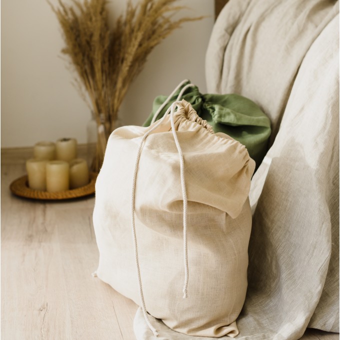 Beige laundry bag with drawstring